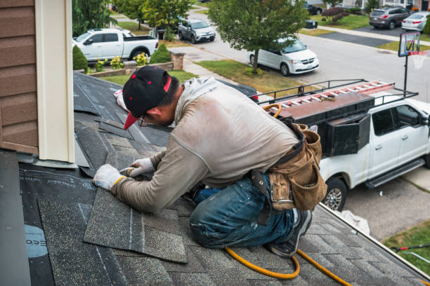 Professional Roofing technician working in East Providence, RI